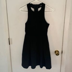 Lulu's black dress with t-strap back and back cutouts Size Medium